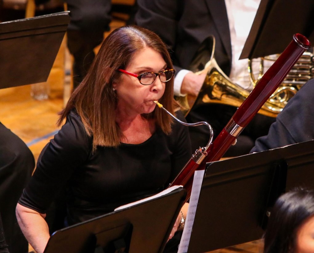 Photo of Teri Taylor playing bassoon at a Tara Winds concert